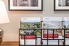 Exklusive Immobilienbroschüren von FRAHM Immobilien mit Angeboten für Häuser und Wohnungen in Handewitt, Flensburg und Umgebung. Präsentation hochwertiger Immobilienexposés in stilvollem Büroambiente.